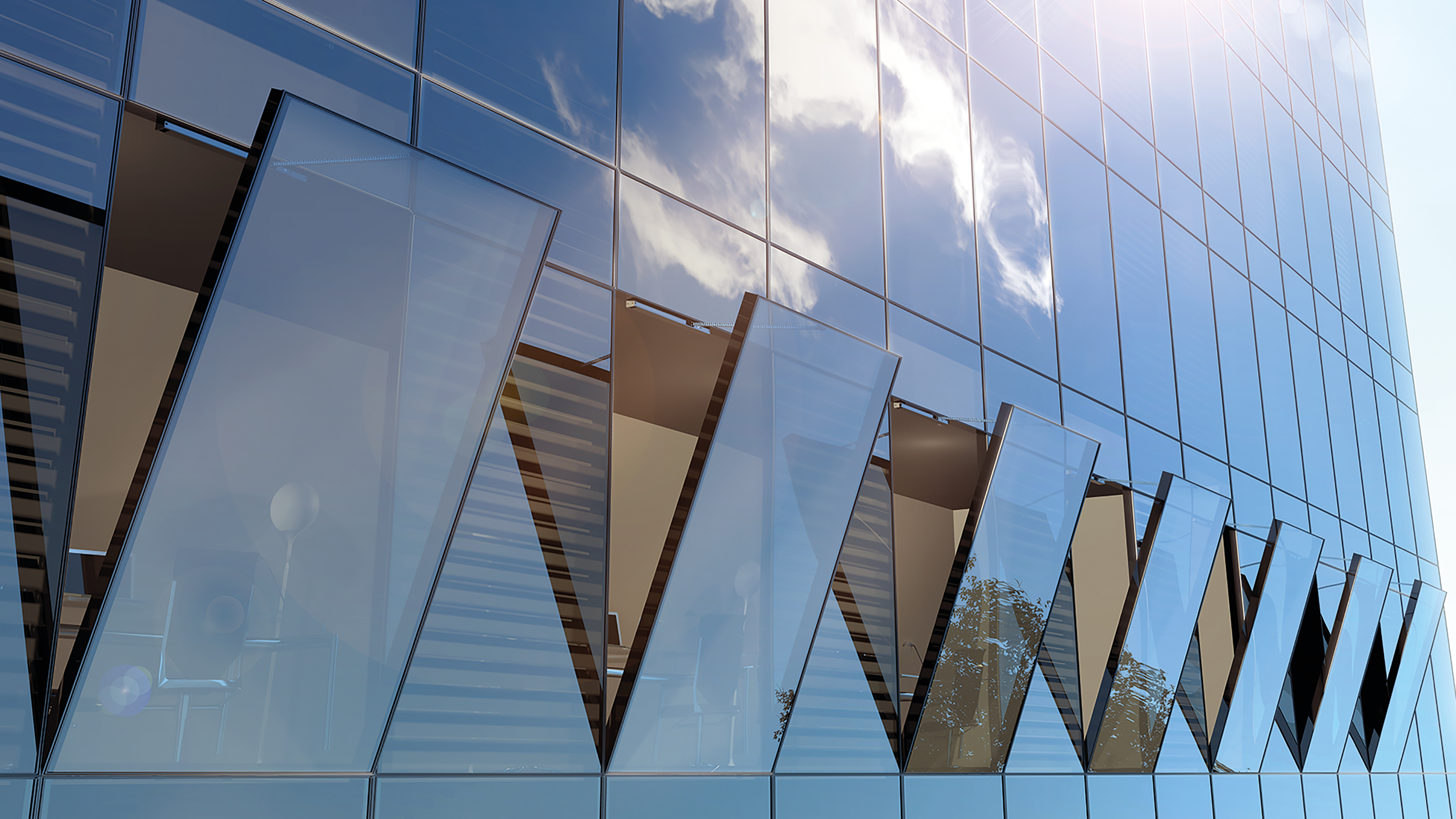 Fassade mit geöffneten Fenstern, kontrollierte natürliche Lüftung. Fotografie: D+H